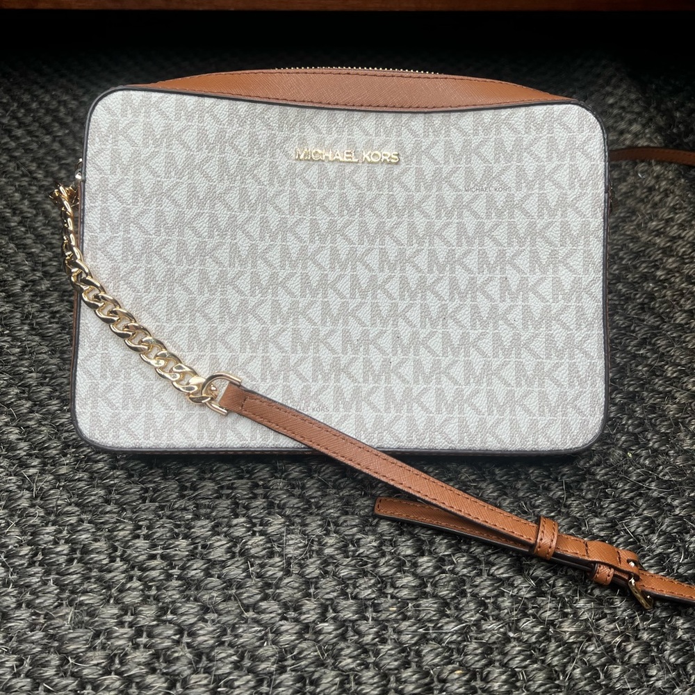 White and tan, Michael Kors cross body bag.